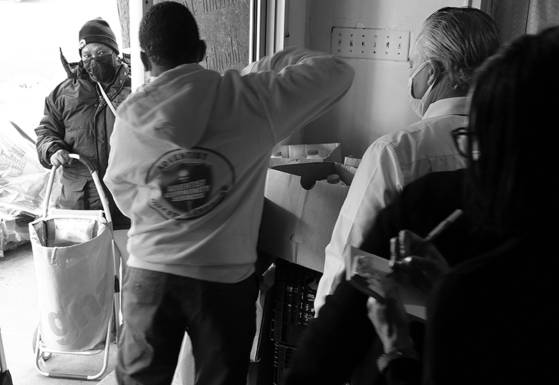 2020 : Food Lines : Seventh Day Adventists Help the Needy : Streetlife : New York City : Times Square : Richard Moore : Photographer : Photojournalist